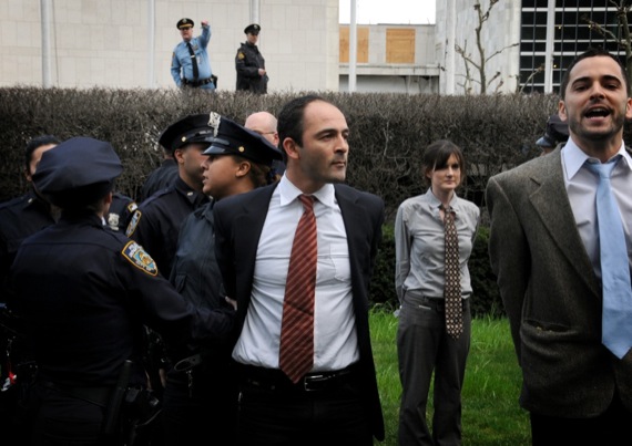 Finally, OWS gets police to arrest the people in suits