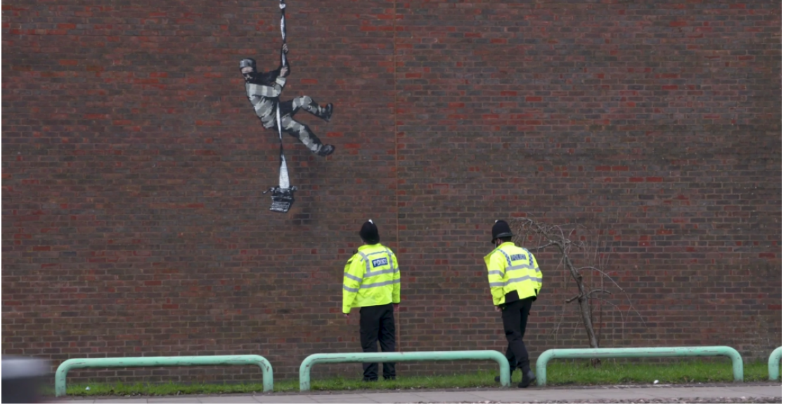 It Looks Like Bansky Has Struck the Wall of England’s Reading Prison, Which Once Detained Oscar Wilde, in His Latest Mural