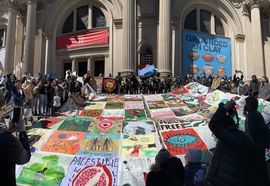 ‘Met Museum, you’re complicit’: artists and activists take over museum’s front steps with giant pro-Palestine quilt